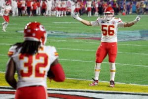 Nick Bolton #32 of the Kansas City Chiefs celebrates with George Karlaftis #56 after scoring a 36 yard touchdown on a fumble recovery during the second quarter against the Philadelphia Eagles in Super Bowl LVII at State Farm Stadium on February 12, 2023 in Glendale, Arizona.
